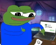 Pepe typing on a laptop